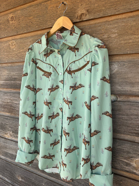 The Mint Bucking Performance Top
